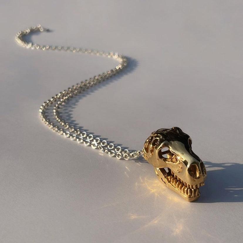 t-rex skull necklace in gold