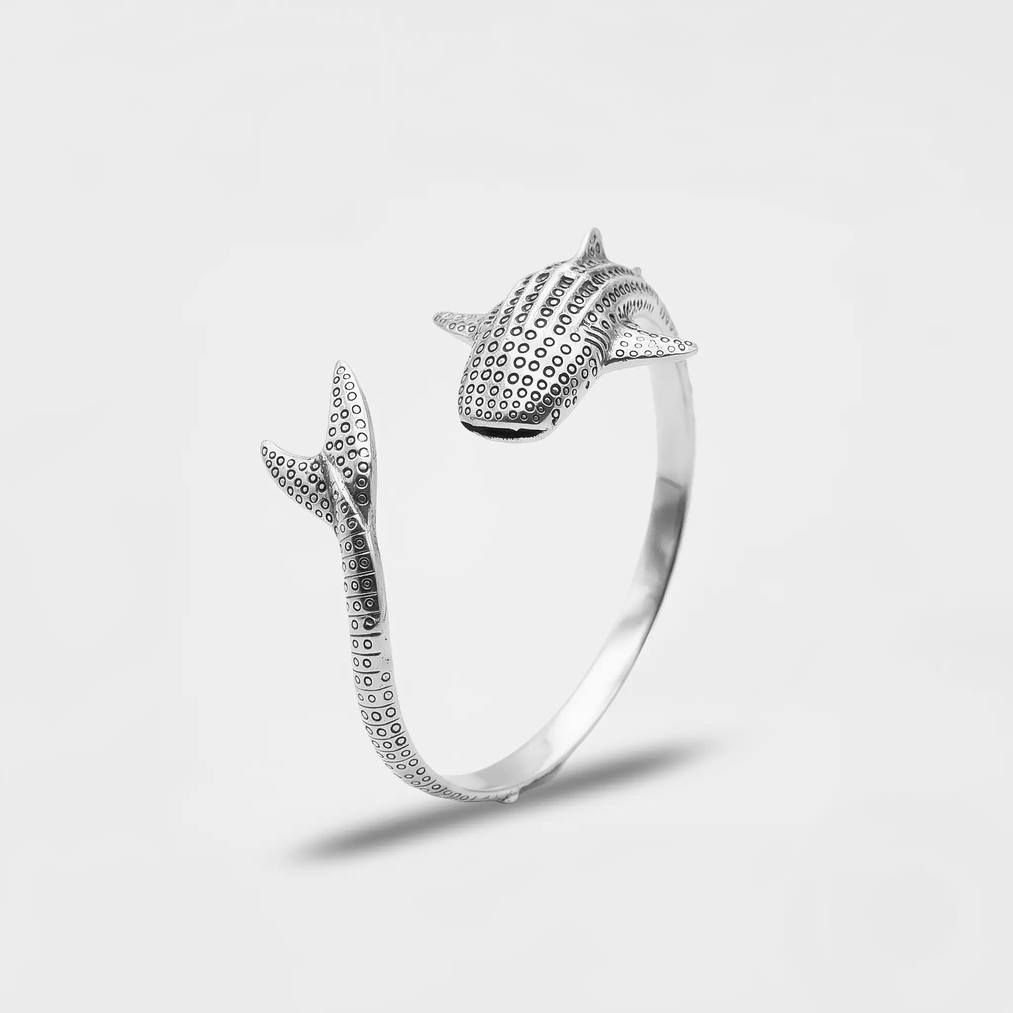 handcrafted whale-shark silver bracelet on a white background